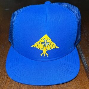 Lrg Royal Blue Trucker Hat with Yellow Tree Emblem